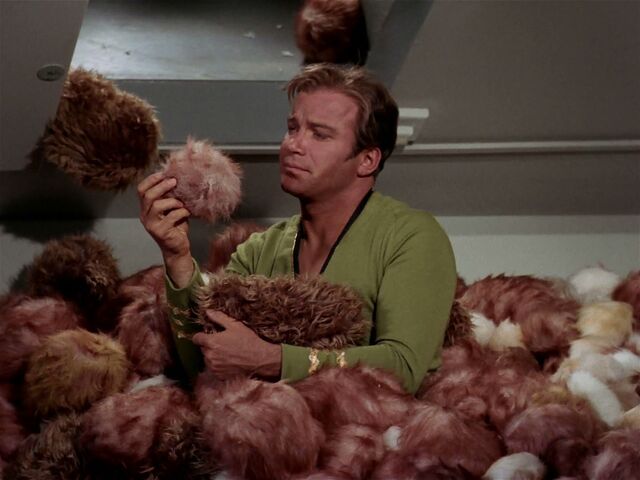 File:Kirk surrounded by Tribbles.jpg