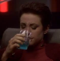 Kira drinking Maraltian Seev-ale.jpg