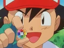 EP026 Ash con la medalla Arcoiris