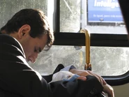 Dad sleeping on bus