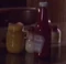 Bottle of ketchup, jar of mustard and salt and pepper