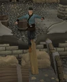 Climbing over low wall.png