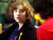 Eli Talking To Clare At Degrassi In Their Degrassi Uniforms With A Concerned Look On Clare's Face