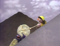 Grover-caveman-biff.jpg