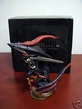 Squall and bahamut statue