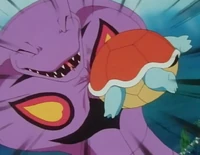 EP061 Squirtle de ash usando placaje