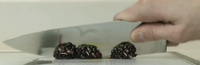 Blackberries being knifed