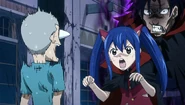 Gajeel helps Wendy scare a kid