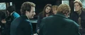 Weasleys after battle.jpg