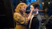 Molly saludando a Harry