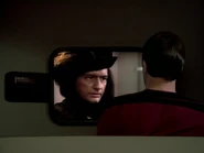 Riker watched footage of Q's visit