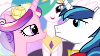 Princess Cadance and Shining Armor smiling at each other S02E26