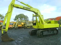 HY-MAC,S IN YARD.