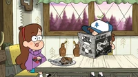 S1e2 dipper reading magazine
