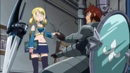 Dan holds Lucy's hand