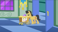 Cherry Fizzy pushing a cart containing an egg S1E23