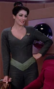 Troi gray unitard with pointed neckline
