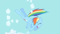 Rainbow Dash begins to clear the sky S1E01