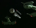 Klingon attack cruisers flank the Pasteur.jpg