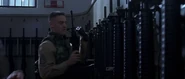 U.S. Marines arm themselves with the rifles