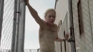 Beth running away from walkers