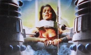Leela imprisoned by Daleks