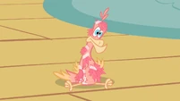 Philomena with feathers taped on S01E22