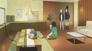 Satoshi playing videogames