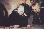 Walther Wenck points at a map and Heinz Guderian looks