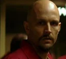Victor Zsasz (Tim Booth)