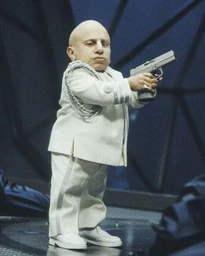 Mini-Me holding a gun.