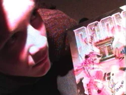Andrew Bassett holding his prize in 1999