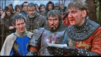King Henry V reads a courier's report of the French dead after the battle of Agincourt.