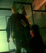Nick concludes their fight by impaling LaCroix on metal spikes.