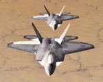 2 raptor in formation above Onyx