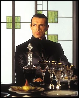 The Merovingian is an old, powerful program that resides within the Matrix. Self-described as a "trafficker of information," the Merovingian behaves much as a leader of a powerful, organized crime syndicate.