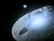USS Voyager being hit by Quantum resonance charges.