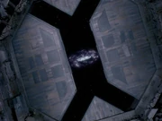 The Jenolan is wedged between the enormous doors of one of the Dyson sphere's hatches