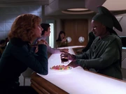 Beverly and Guinan talk about Wesley