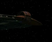 Vulcan shuttle disembarking from Enterprise.