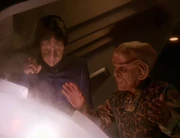 Hanok and Quark work together to defuse a Jem'Hadar torpedo.