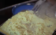 An 'Owon egg omelette being prepared.