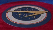 The Starfleet and UESPA seal (2155)