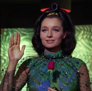 A sensor web being worn over ordinary clothing in 2268.