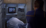 Archer views Fuller's corpse.