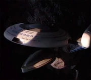 L'USS Pegasus coincé dans la roche de l'astéroïde Gamma 601.