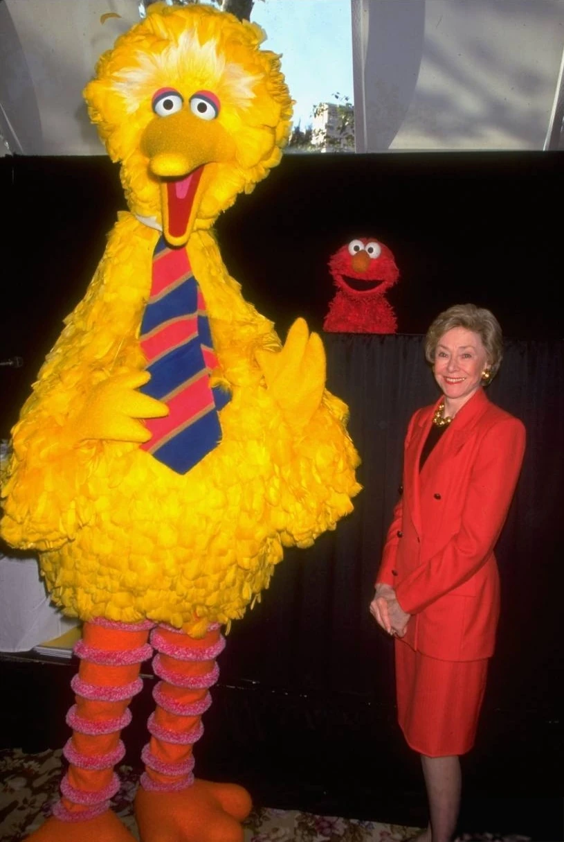 Cooney with Big Bird and Elmo