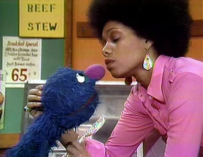 Vi to Grover: "You're as sweet as they come, sugar."
