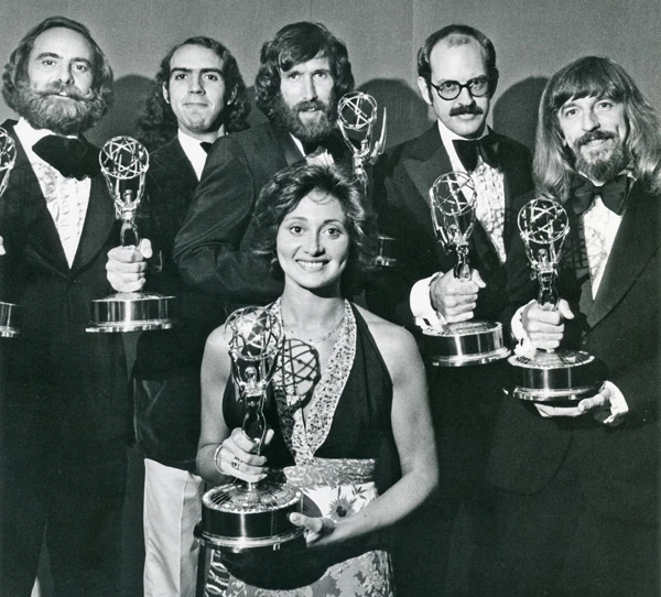 Left to right, Jerry Nelson, Richard Hunt, Jim Henson, Frank Oz, Caroll Spinney, and Fran Brill accepting their "Outstanding Individual Achievement" awards for Sesame Street in 1974.
