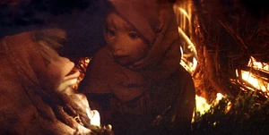 Kira as a child with her mother.